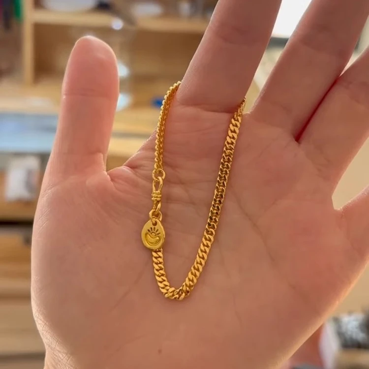 金色古巴链手链女轻奢小众精致女款2025新款吊坠金元宝旺财手饰品