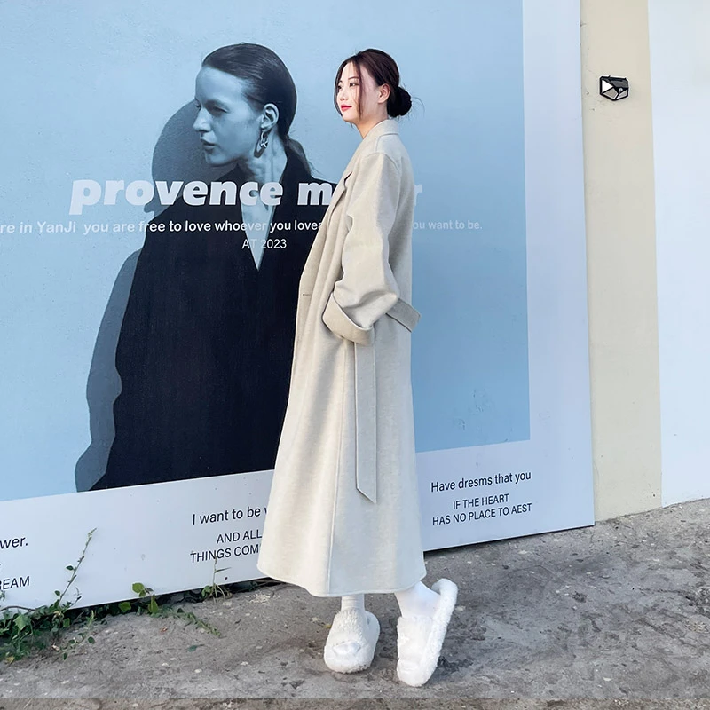 2025秋冬新款杏色羊驼毛立领双排扣腰带长款女羊毛大衣