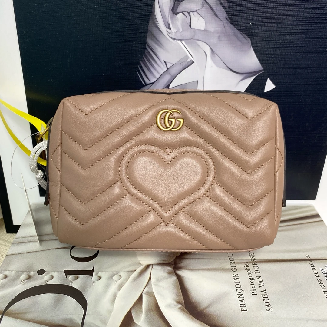 95新 GUCCI/古驰 马蒙奶茶色洗漱16707523手拿包mini