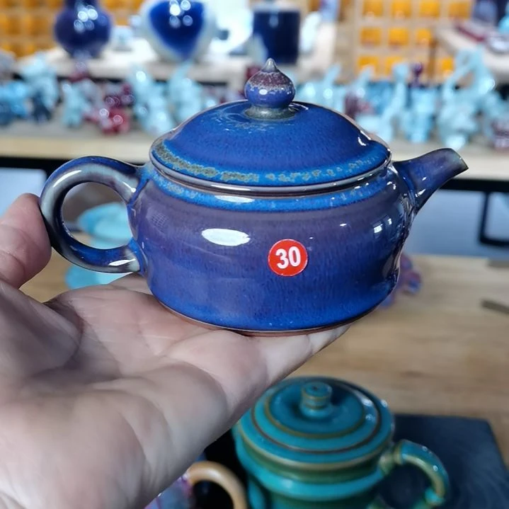 30炭烧工艺孔雀蓝仿古壶