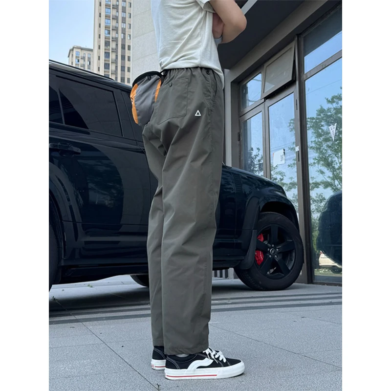 藏青色防水冲锋裤男夏季户外薄款小三角标休闲裤微锥直筒速干长裤