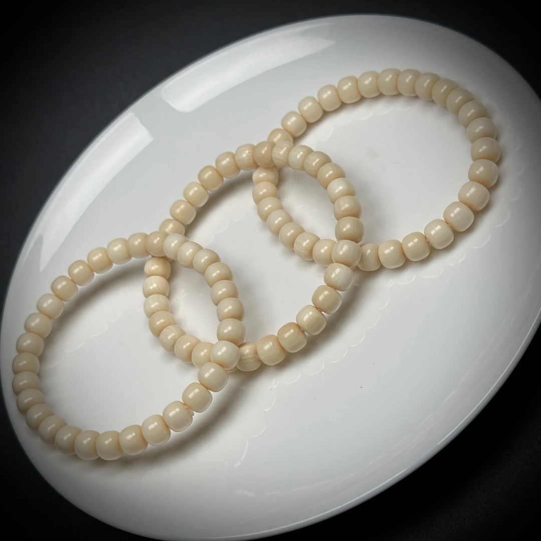 C004【7×6毕业】奶油白乳牙牙芯料猛犸牙手串7×6mm随机一条