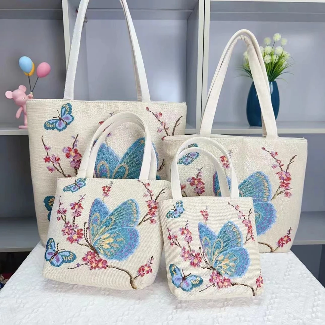 梅花蝴蝶帆布包包爆款2025新款时尚手提包简约休闲百搭女款帆布包