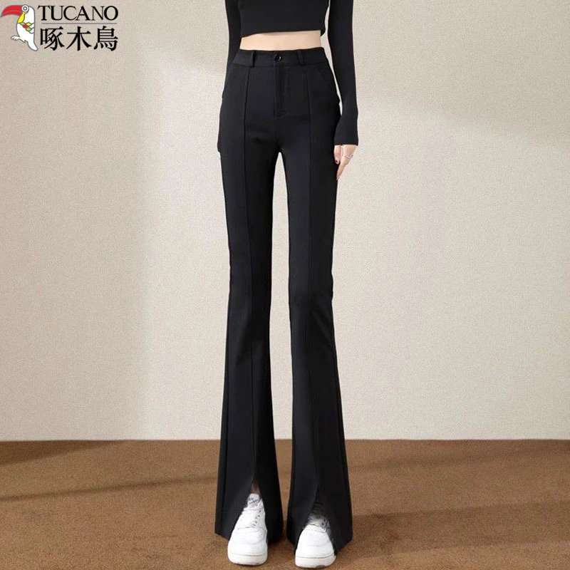 啄木鸟秋季黑色微喇裤女装高级感开叉休闲九分裤高腰显瘦垂感长裤