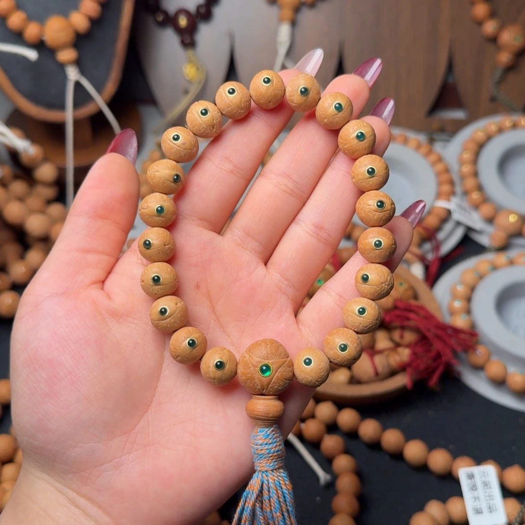 把件凤眼菩提11.5镶嵌绿玛 细腻奶黄皮