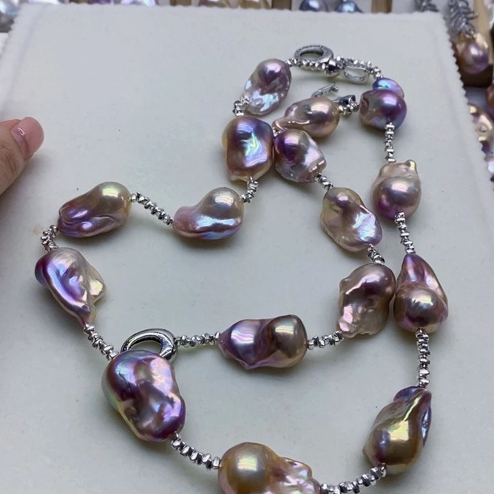 银S925镶嵌淡水珍珠耳饰乔***卡