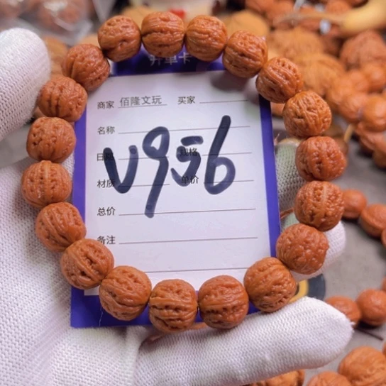 文玩核桃吊坠随**客核桃手串