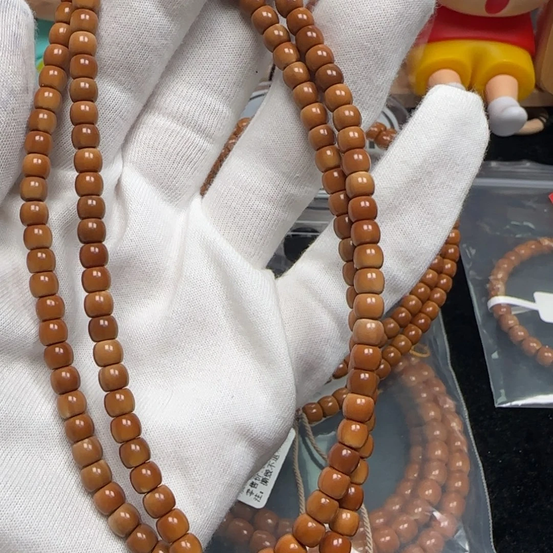 橄榄核手串老挝长串极限弧微白5.4mm