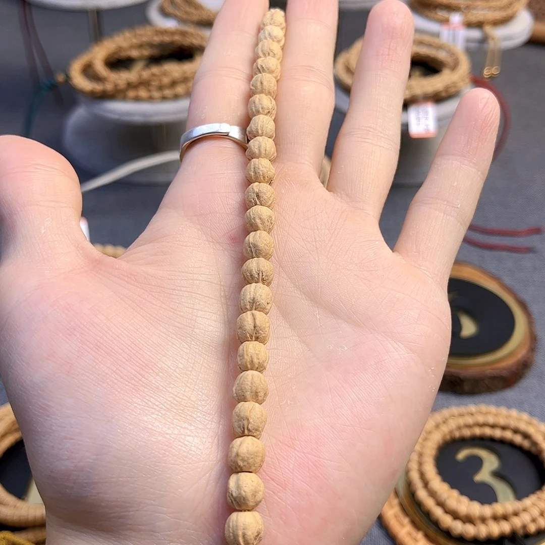 柏香籽/百香籽吊坠袍**家