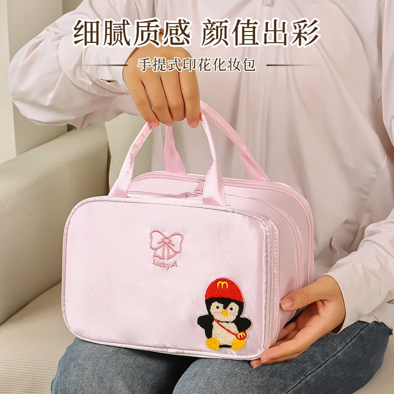 高颜值三层蝴蝶结化妆包大容量防水化妆品收纳包少女手提洗漱包