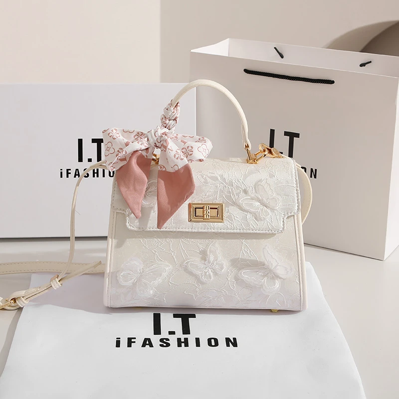 香港轻奢2025新款真皮高级感刺绣蝴蝶手提包包女士单肩包斜挎包包