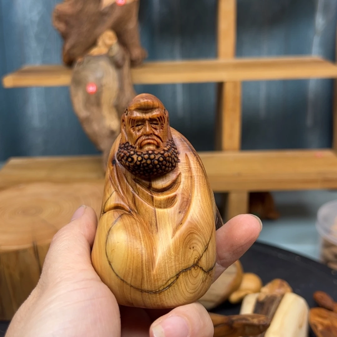 木哪**奇崖柏木摆件手把件