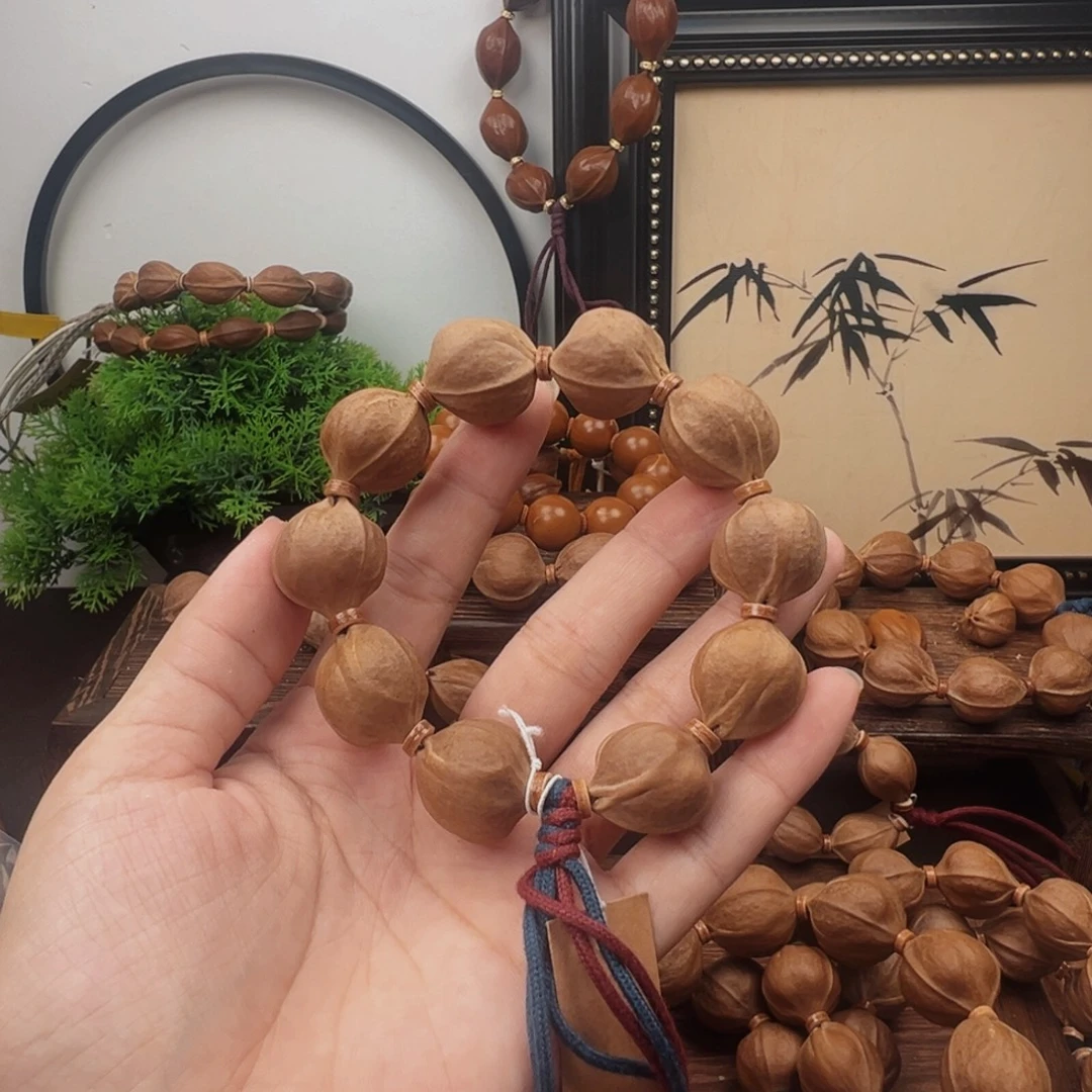 话***傲手串橄榄核19.21梅林铁核