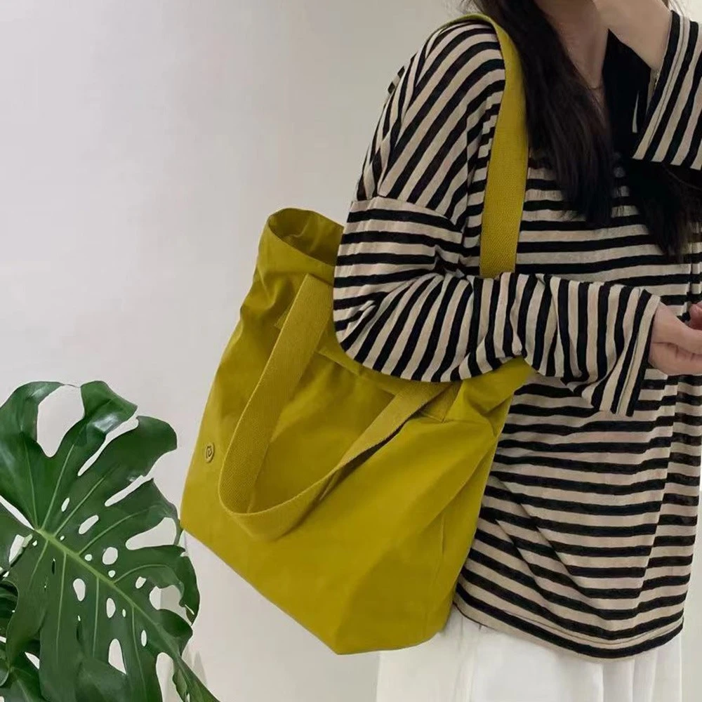 简约纯色单肩包高级设计感斜挎通勤包高颜值大容量质感手提托特包