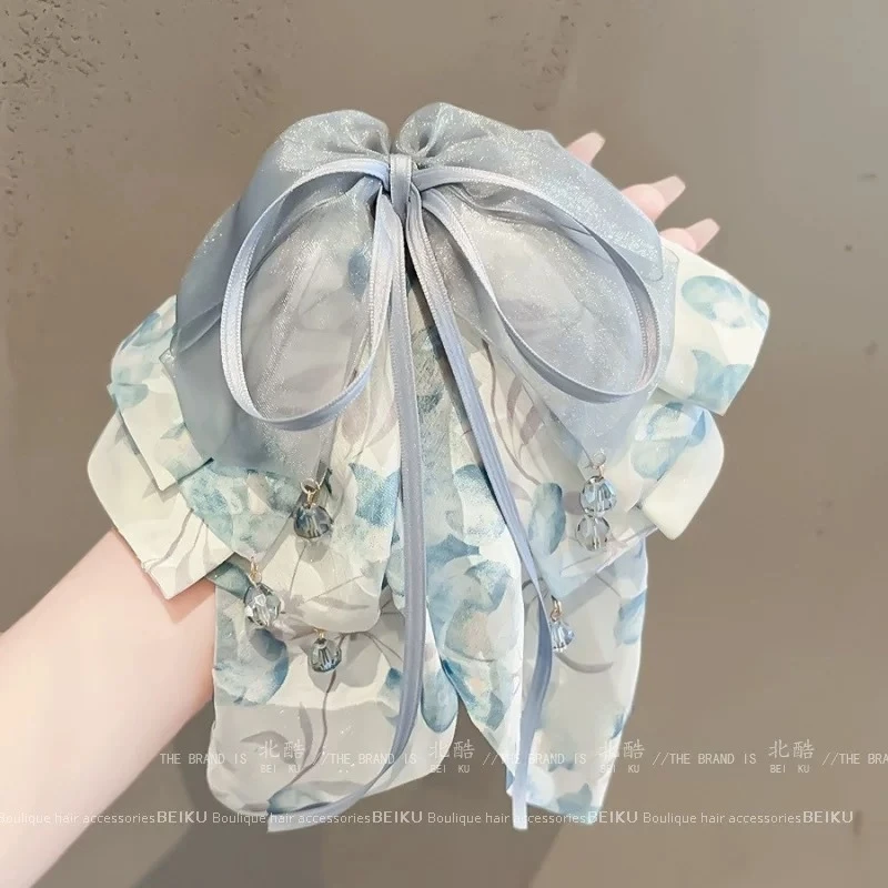 A044海盐蓝飘带蝴蝶结马尾抓夹女新款水晶点缀高颅顶时尚鲨鱼夹子