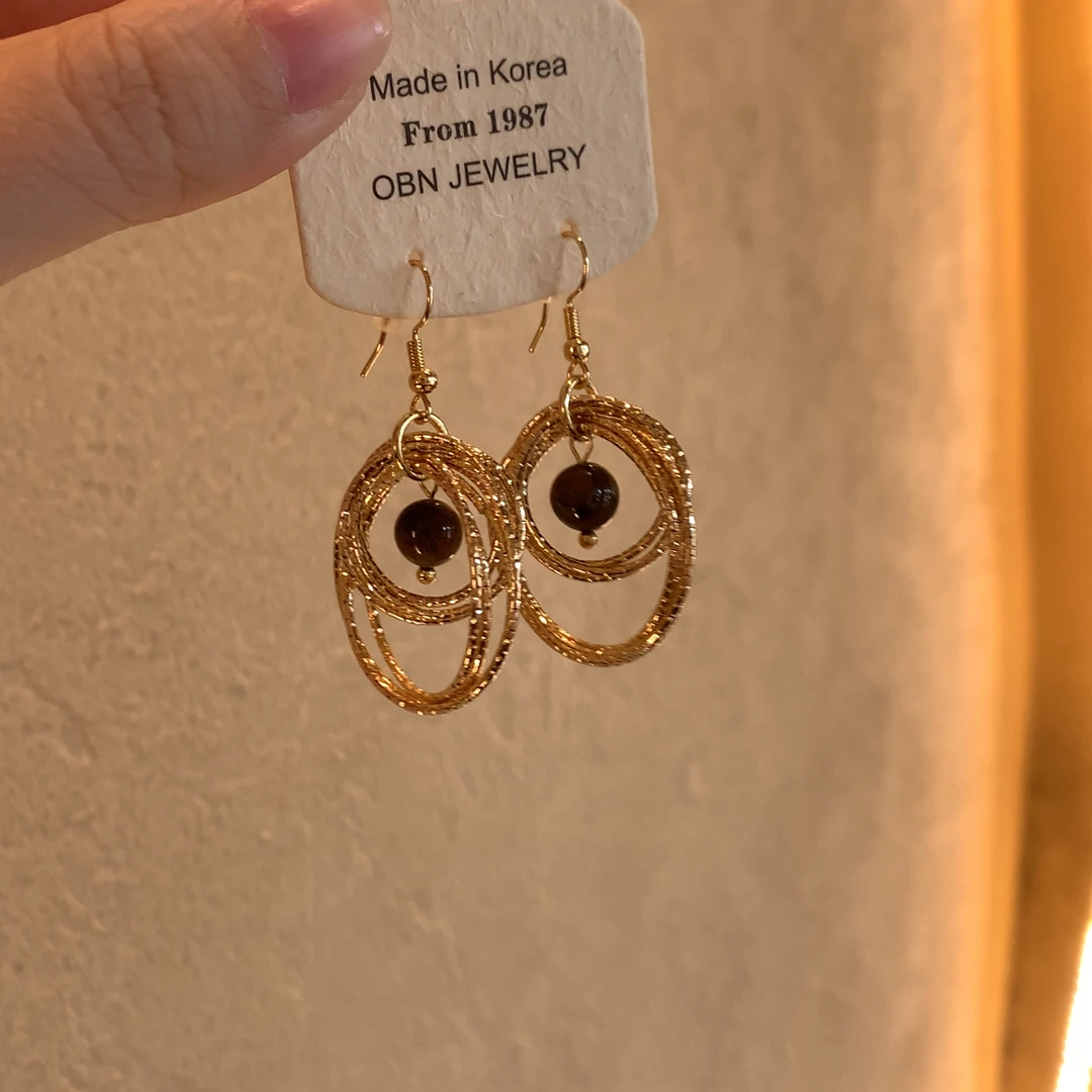 铜合金仿水晶耳饰 金色虎眼圈圈耳环女小众设计感高级夸张耳饰