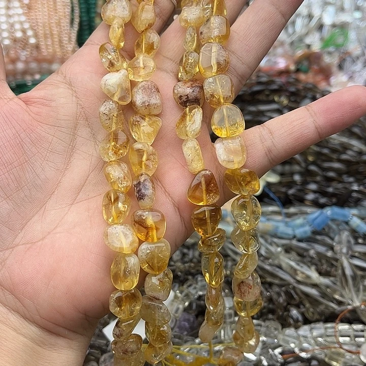玛瑙/玉髓未镶嵌珠宝半成品一条黄塔晶随型