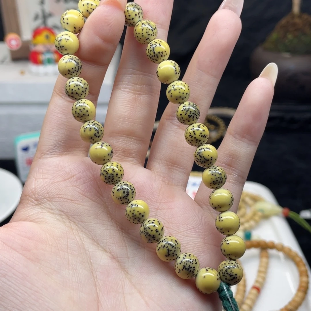 星月菩提吊坠H2 龙珠手持鸡油黄