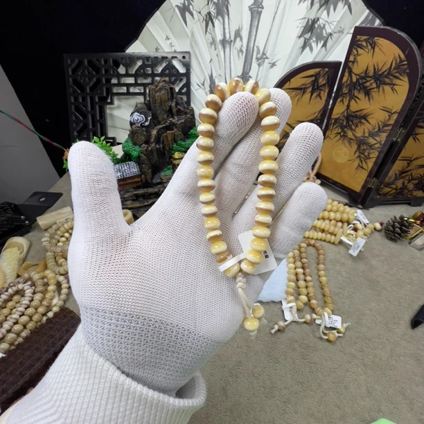 原生态驼骨老料黄白手持卡10随型珠微微棕毕业级款式