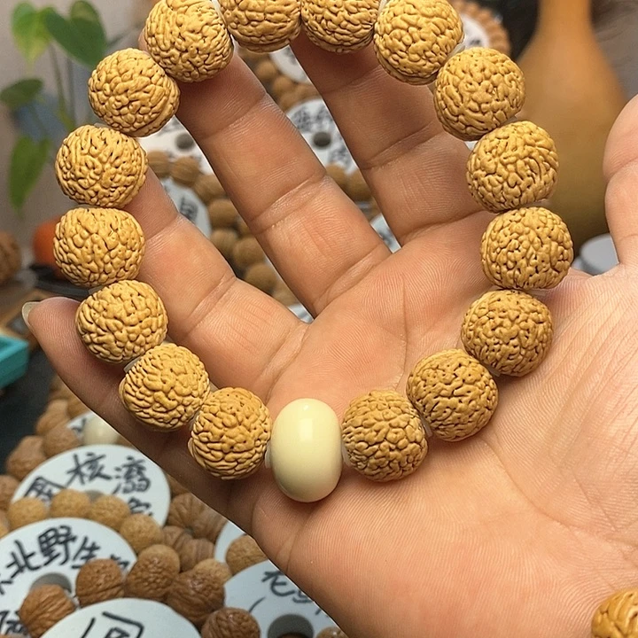 【闪购商品】心****上桃核龙鳞凤尾手串