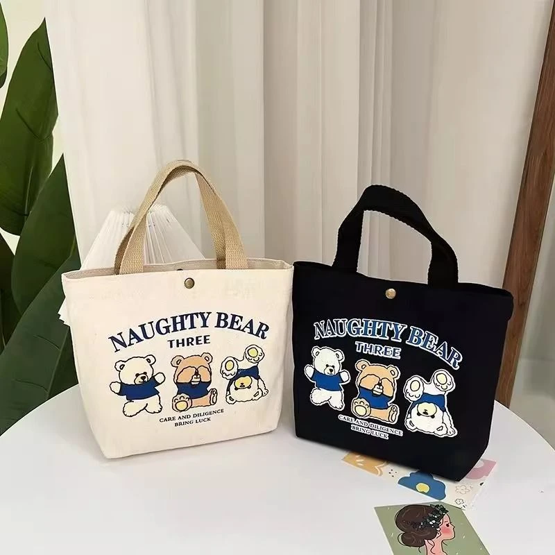 可爱小熊手提帆布袋上班通勤学生装书水杯迷你小号文艺手拎女包包