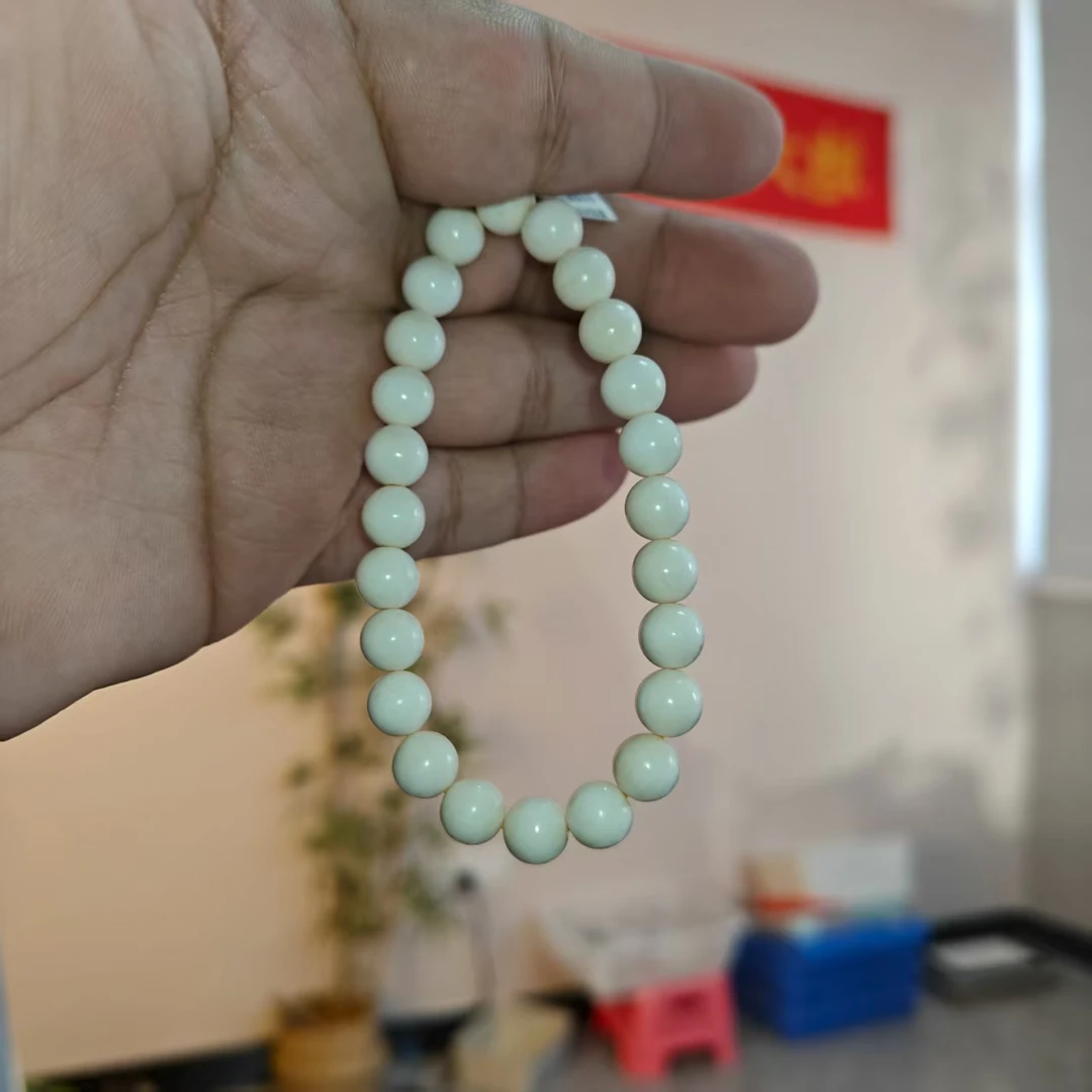 约8mm猛犸牙圆珠单圈手串