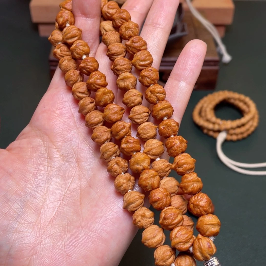 柏香籽/百香籽吊坠白牙横打手持