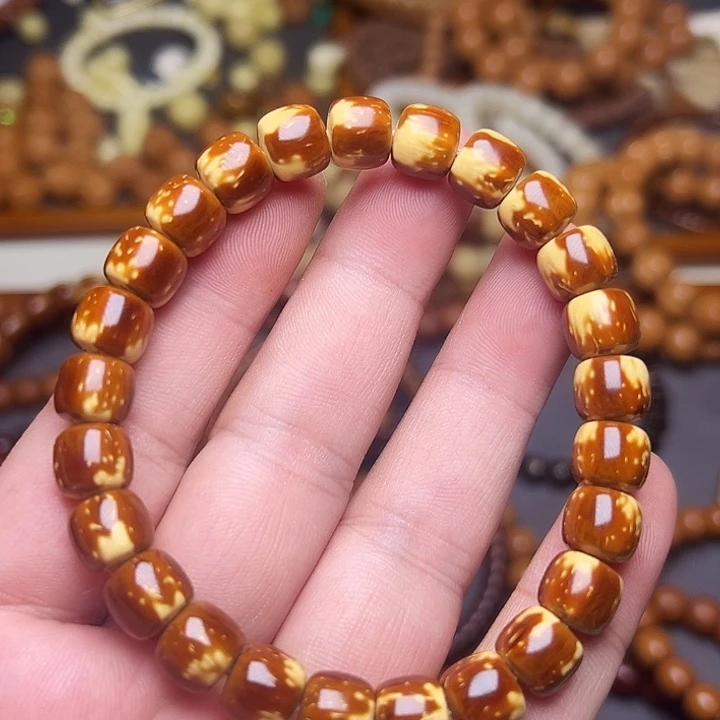 刘****手串猴头核桃紫金鼠实心花皮熊猫鼠小老型手串单圈