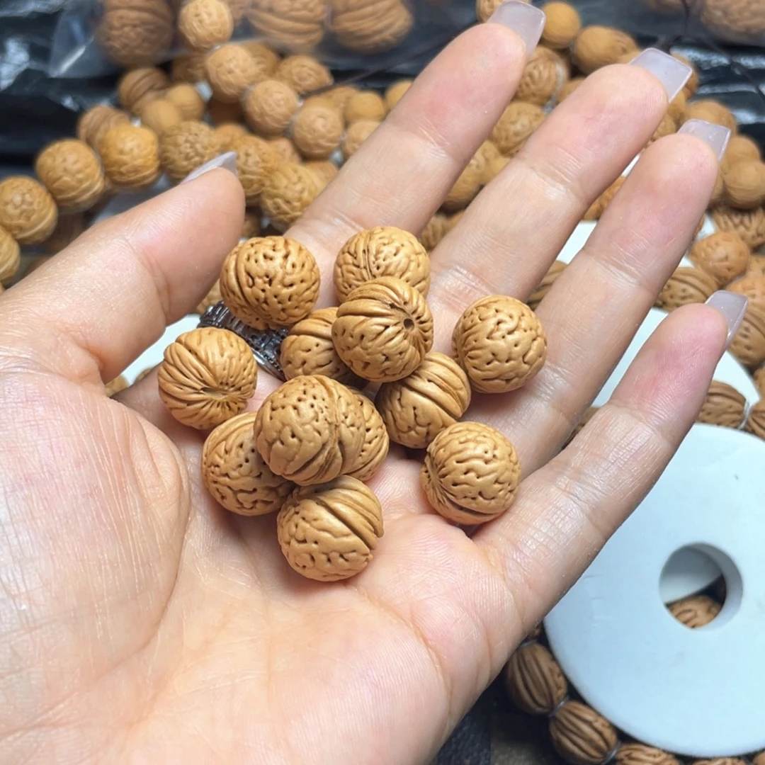 爱***黑木质类桃核手串15+金丹