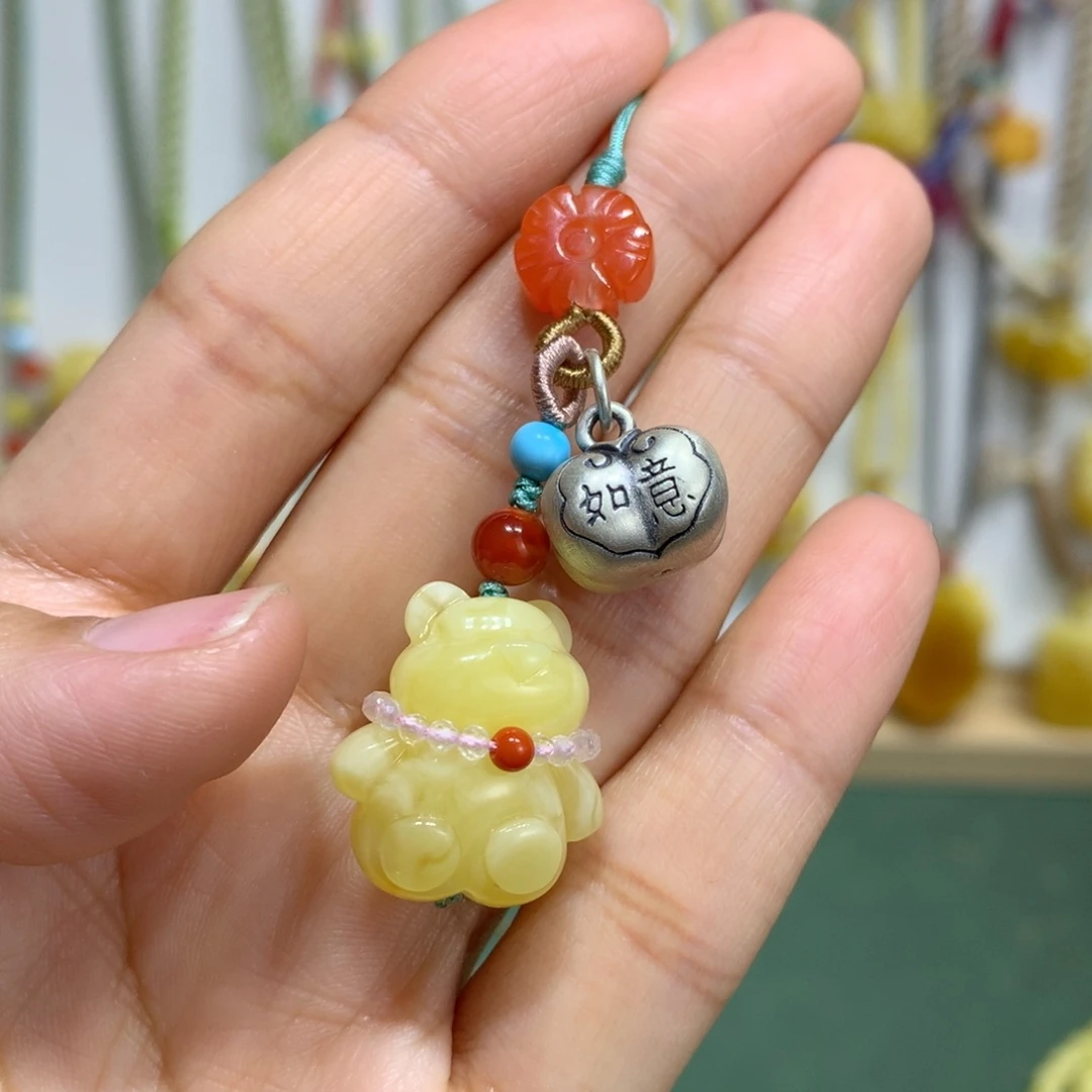 琥珀裸石足银镶嵌手机挂