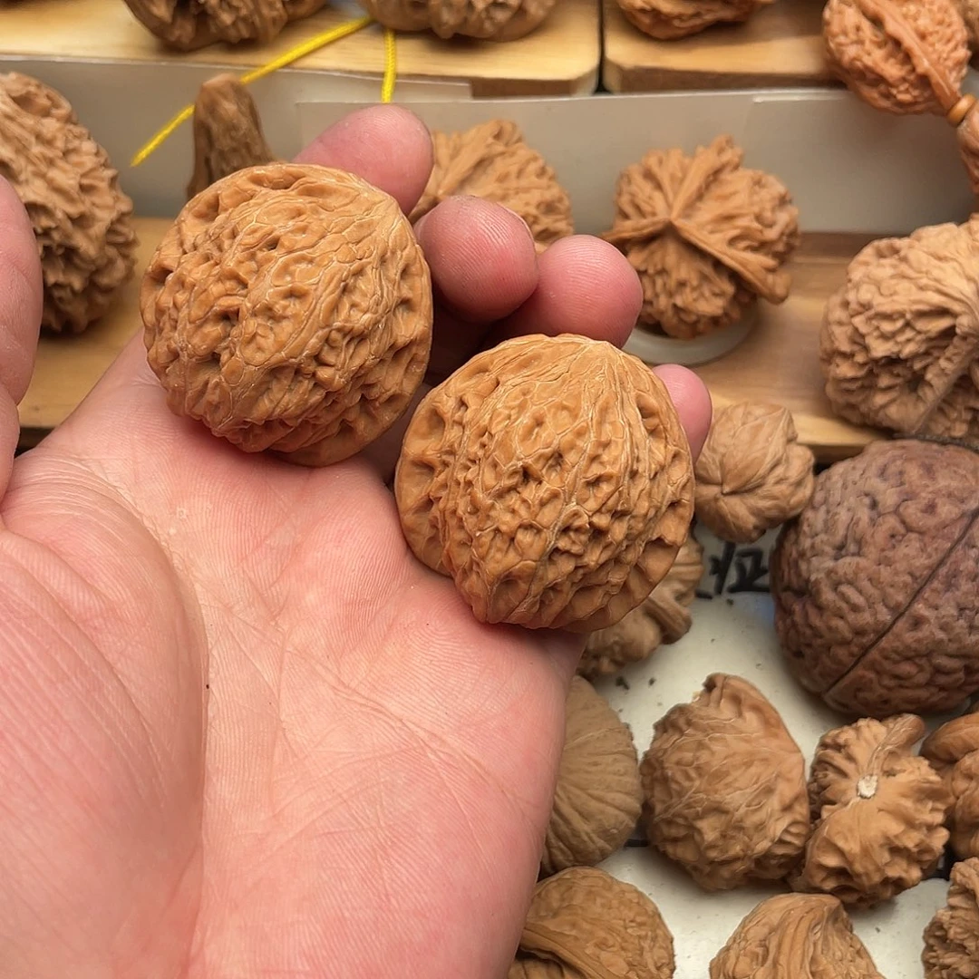 刘***屈文玩核桃吊坠铁锤