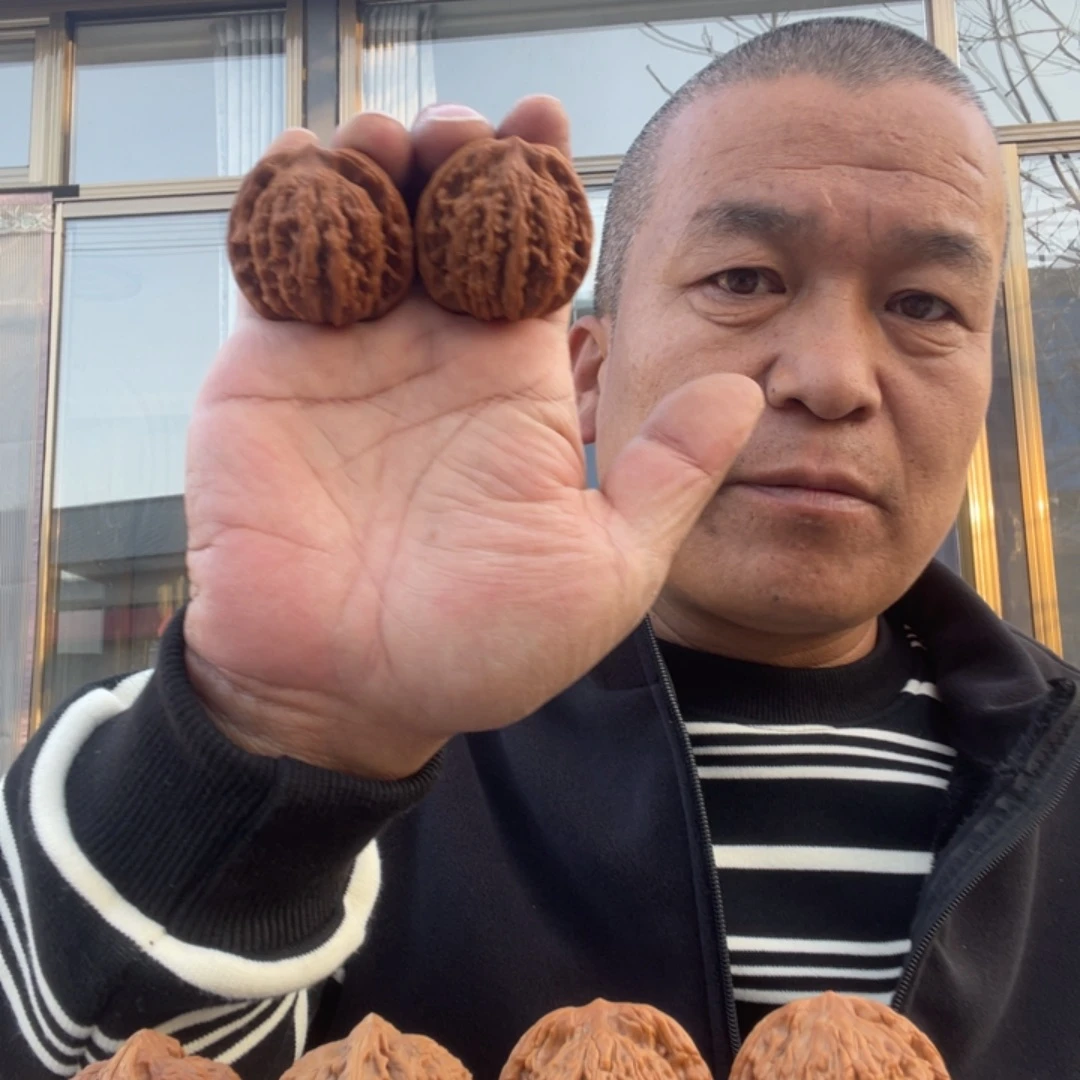 永***弃文玩核桃吊坠虎头42