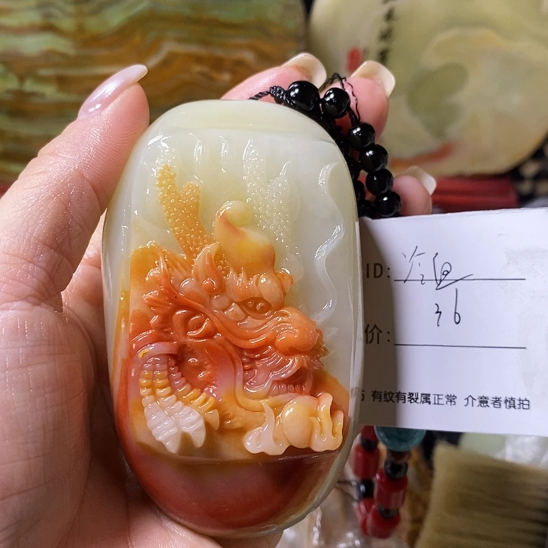 石材?****。古青石手把件