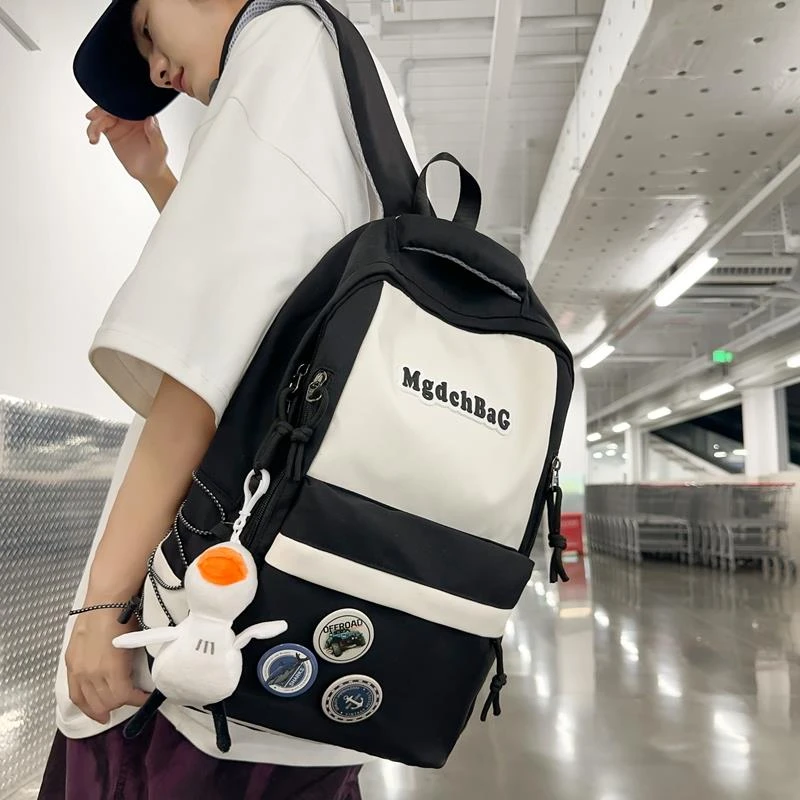 FAVMARTHA中学生男书包女初中生大容量高中生小学生双肩包男大学