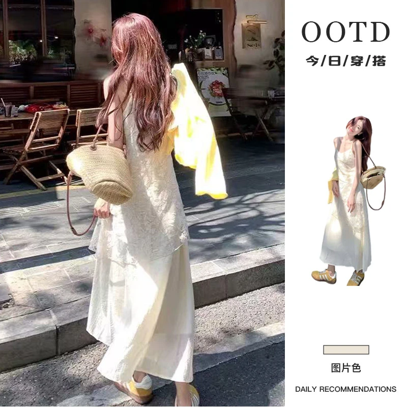 法式高级感白色吊带连衣裙子女夏季新款海边度假绝美气质沙滩长裙