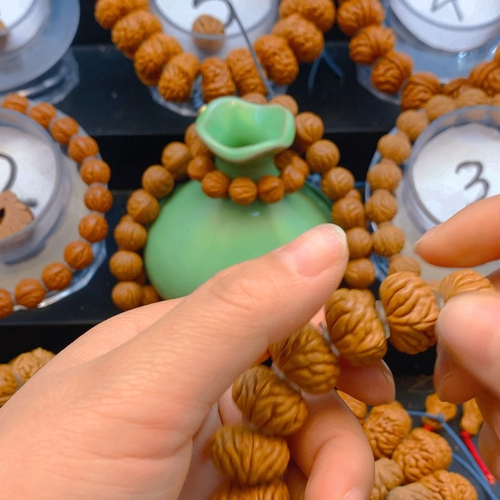 桃核吊坠～*～算盘珠妮妮