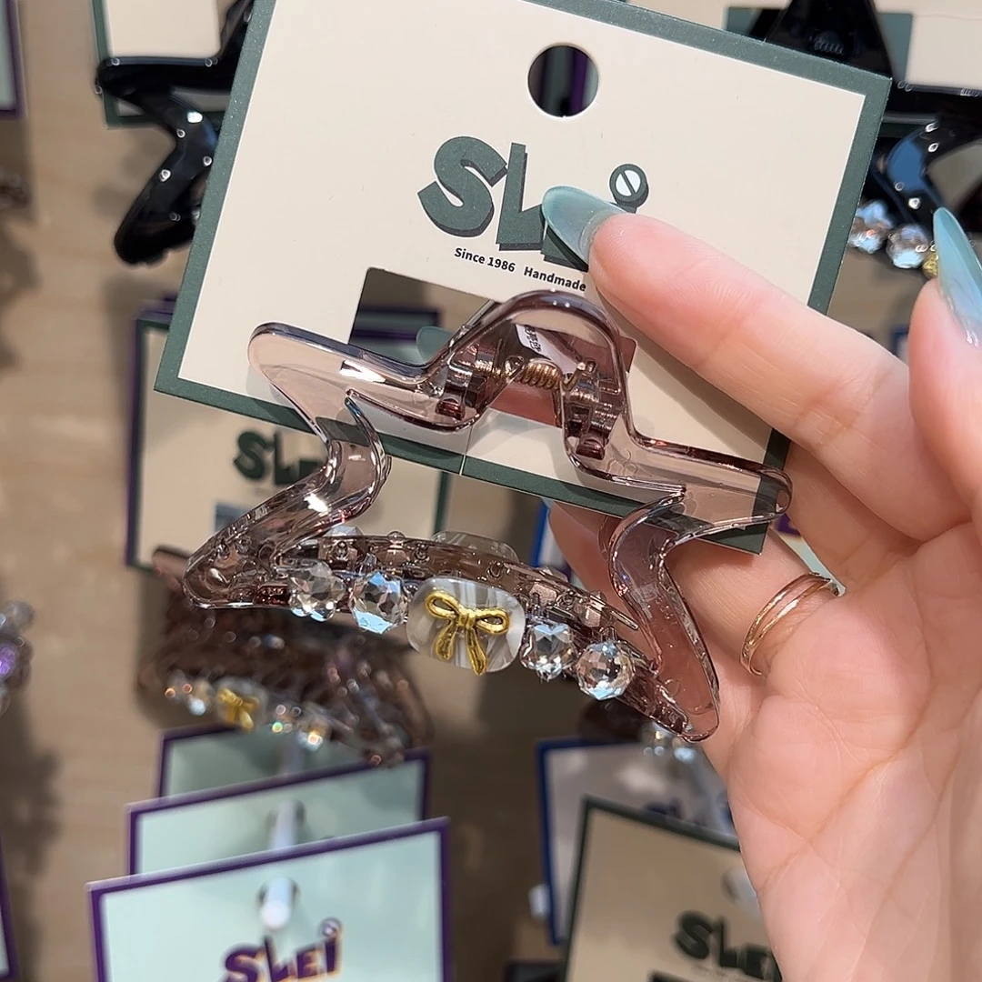 无非金属茶色蝴蝶结星星抓夹