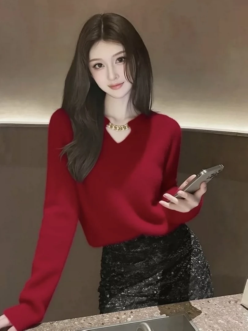 设计感小众时尚洋气时髦轻奢高级感针织上衣红色镂空套头毛衣女冬