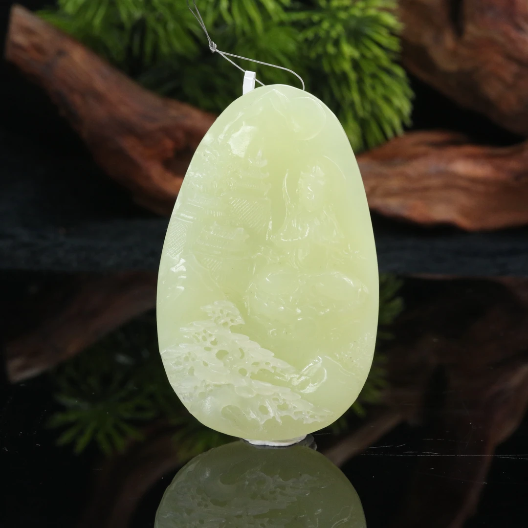 6和田玉若羌黄口山水观音/800016北京中保拍卖