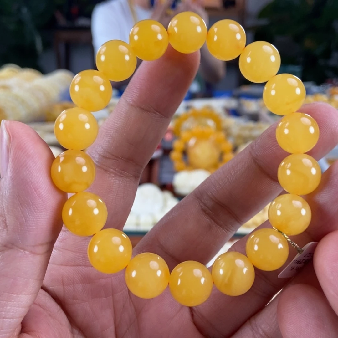 琥珀未镶嵌珠宝奇石11鸡油红手串16.16