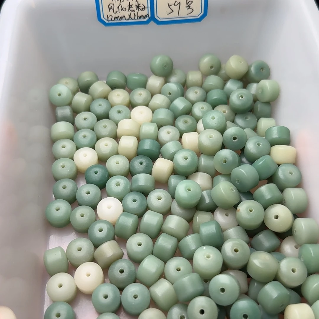 吊坠菩提根/象牙果50颗奶绿金轮11