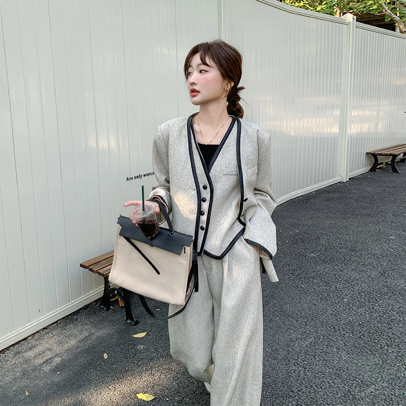 盐系穿搭减龄三件套装女2025春季新款高级气质西装马甲阔腿裤套装