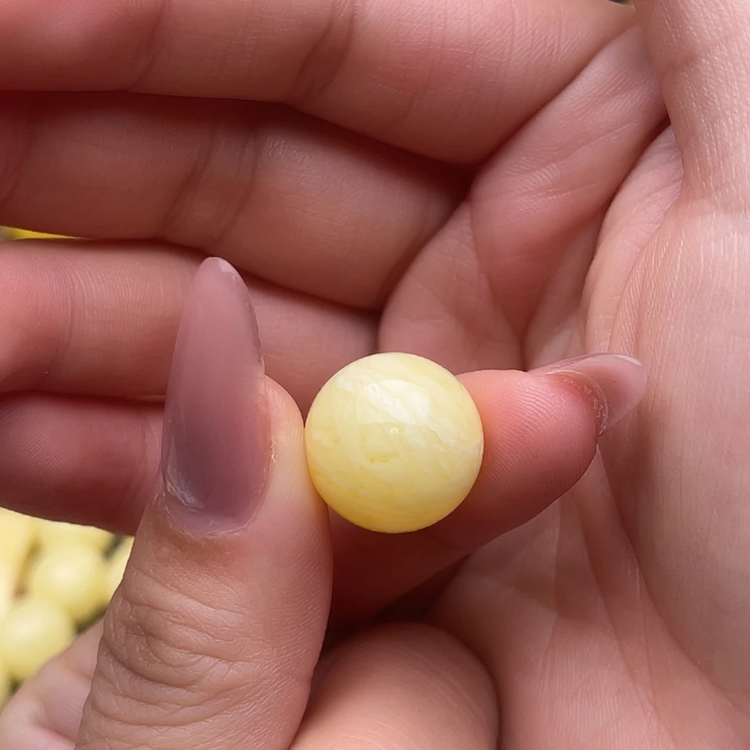 Z****琥珀未镶嵌裸石蜜蜡圆珠梦微瑕