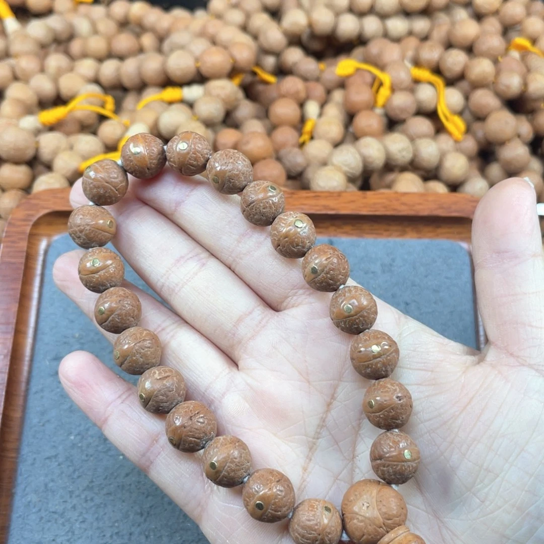 凤眼菩提手串L555-K44凤眼菩提11+红皮镶嵌