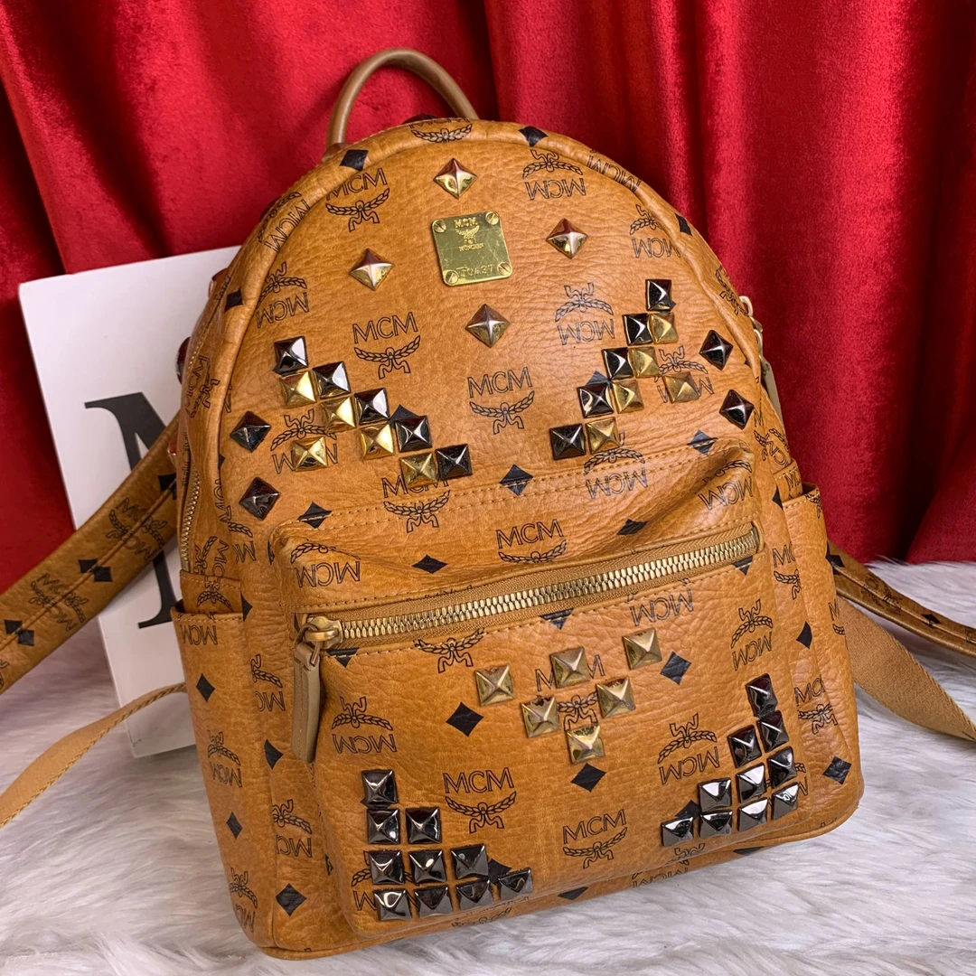 95新 MCM 干邑色双肩包/EE09519022/9022