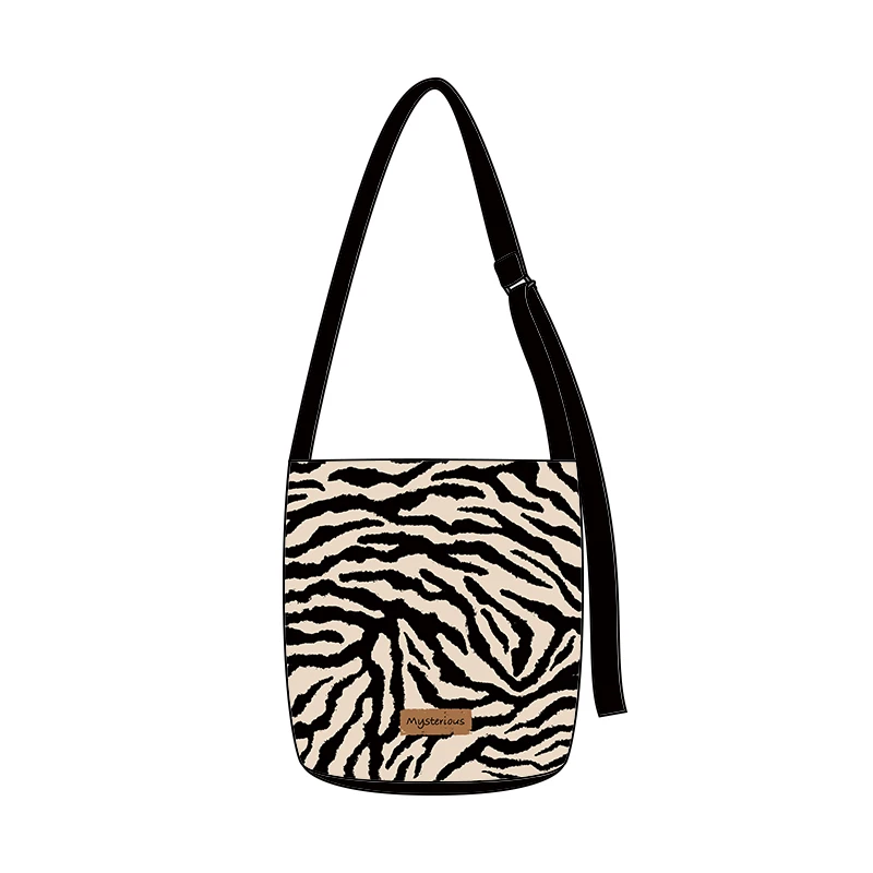 艺术鸭设计师原创斑马纹样椭圆底飘带水桶包单肩斜跨手提通勤时尚