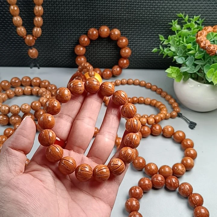 桃核手串铁籽密纹黄皮14
