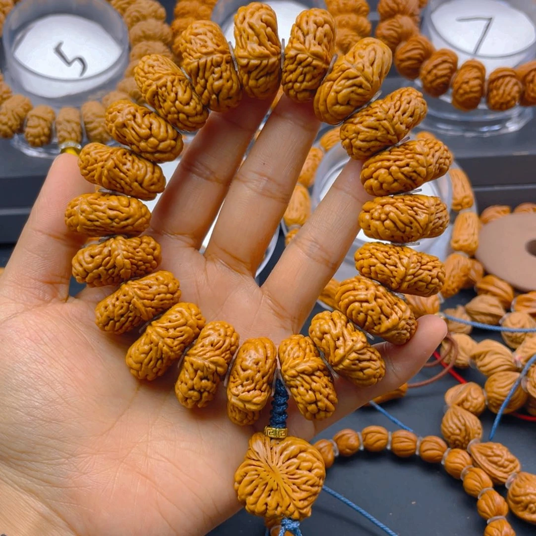 桃核手串飞**戈红红火火过大年的10