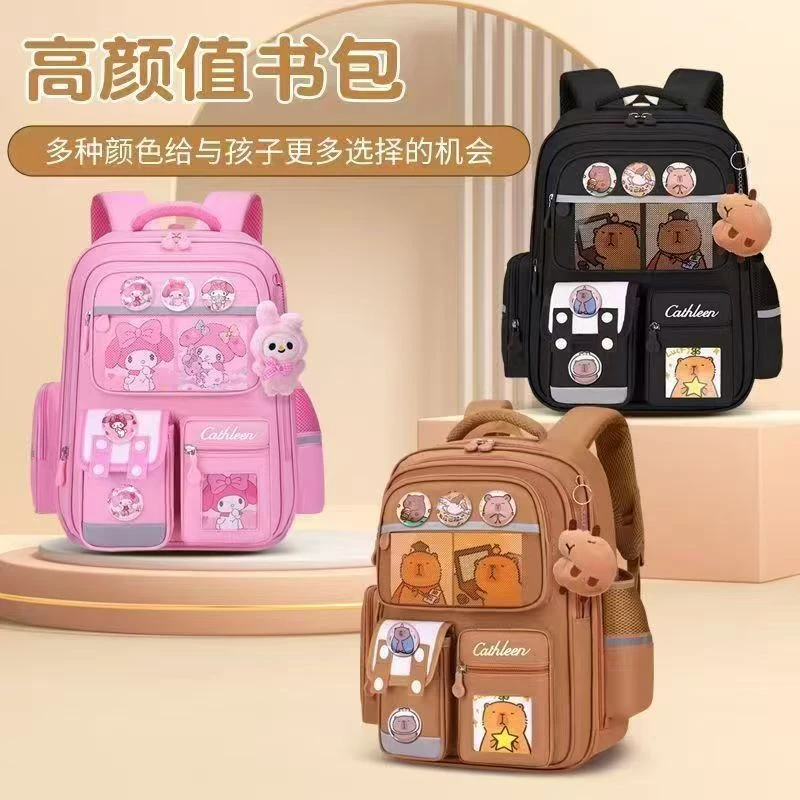 新疆专卖小学生1 - 6年级大容量减负护脊双肩包爆款书包