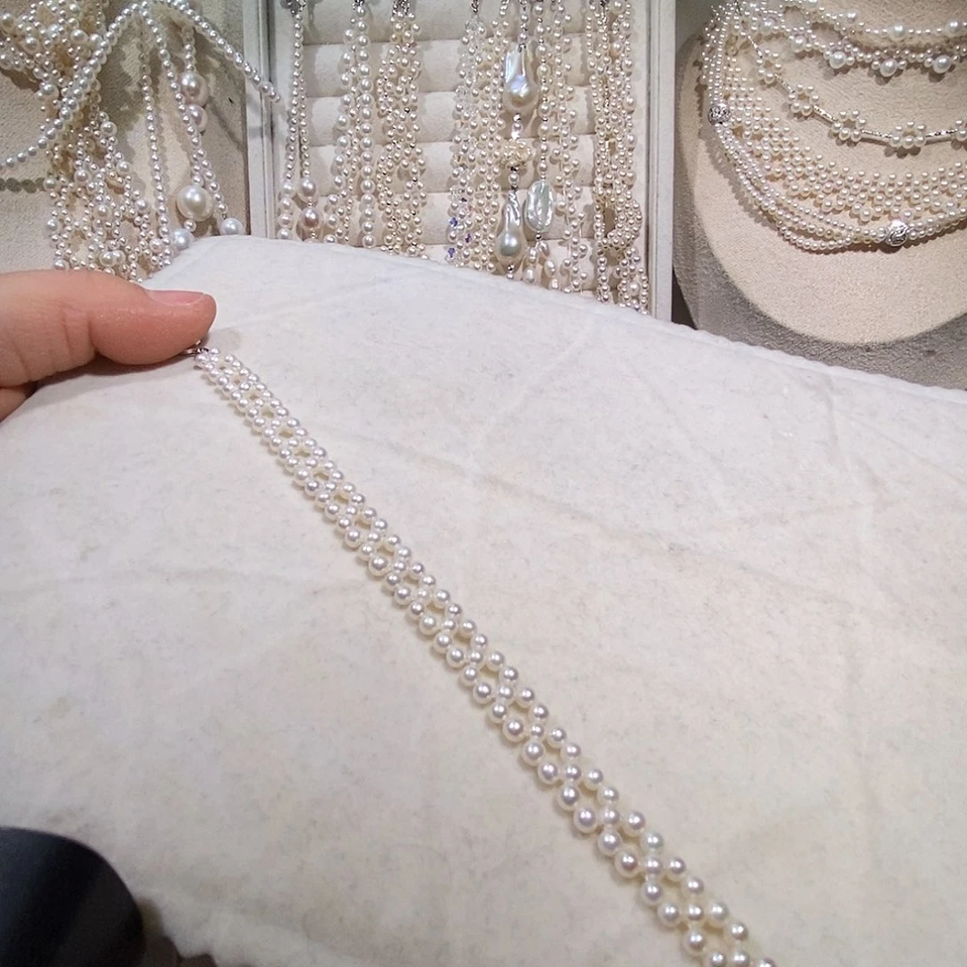 银S925镶嵌淡水珍珠手绳极光编织手链